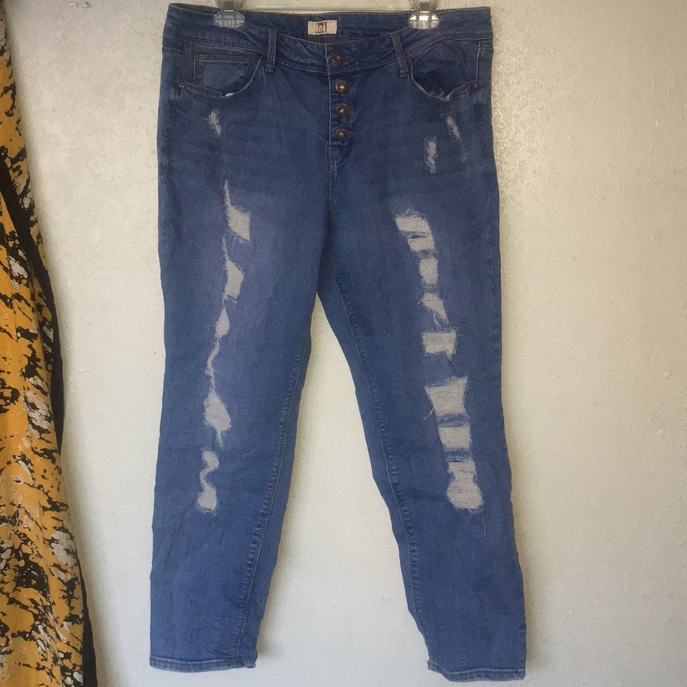 Distressed denim jeans